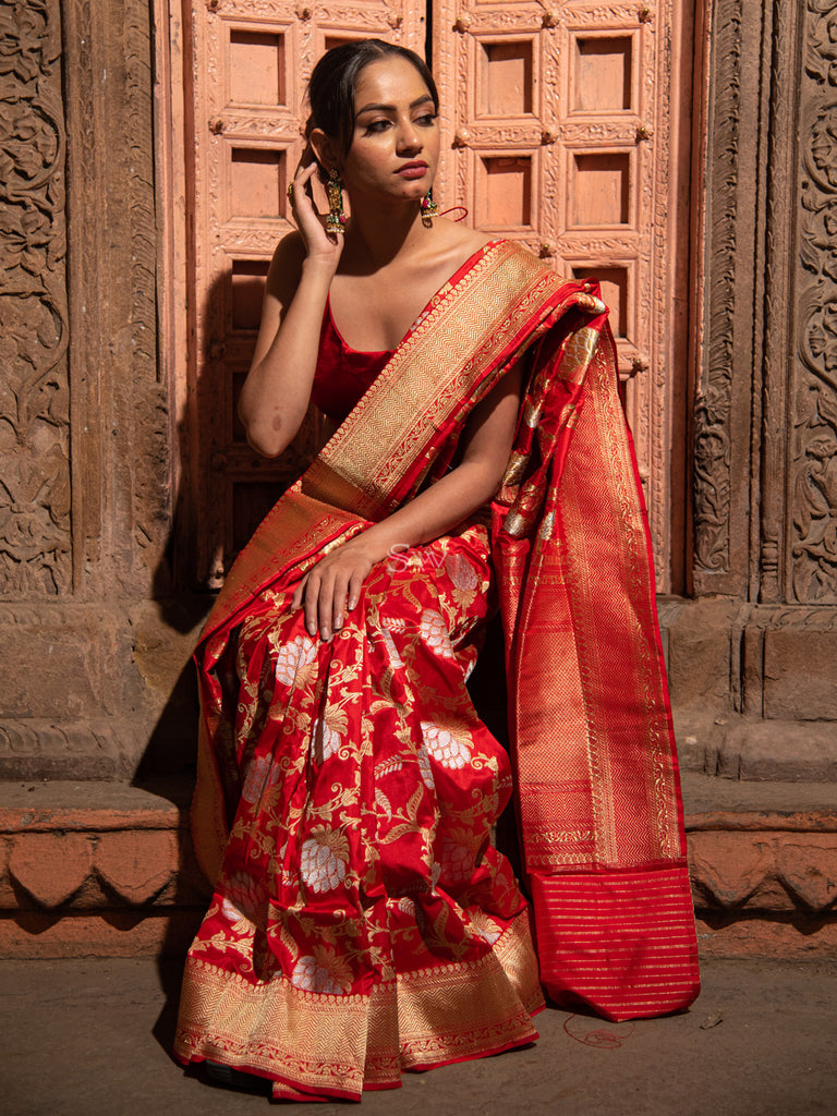 Indian Wedding Saree - Banarasi silk red saree teamed up with a green blouse  adorned with weaving. . . Price: US$ 68.25 . . Product code: 1646255 . . .  #indianweddingsaree #silk #