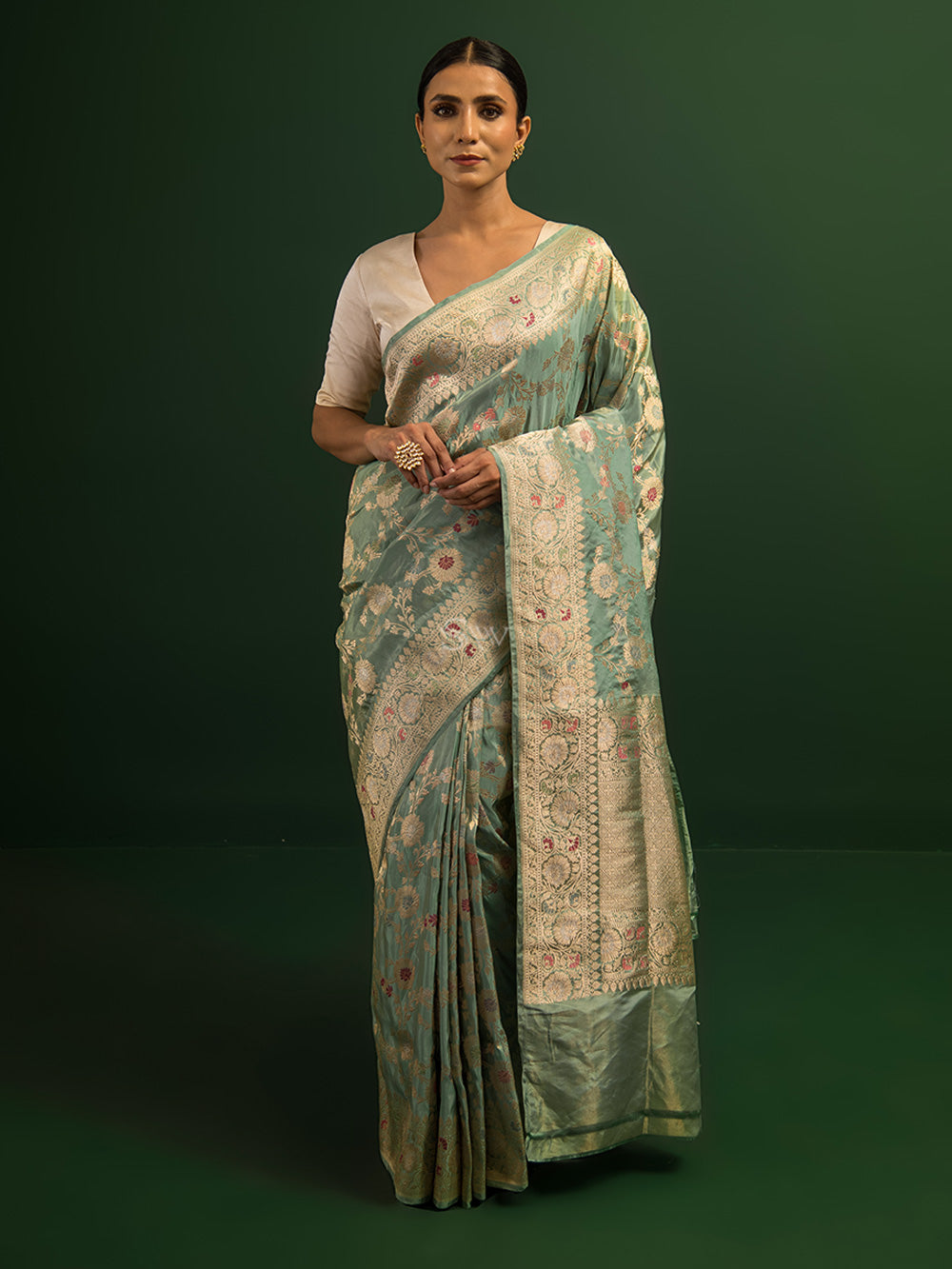 Wrapped in threads of tradition, the Banarasi saree whispers tales of  timeless elegance. 🌺✨ #BanarasiGrace | Instagram